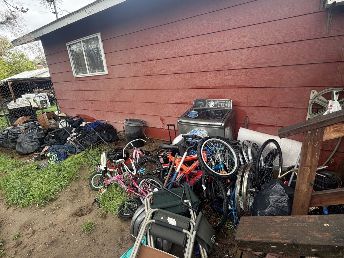 Yard debris and old bikes hauled from a Payette-area property