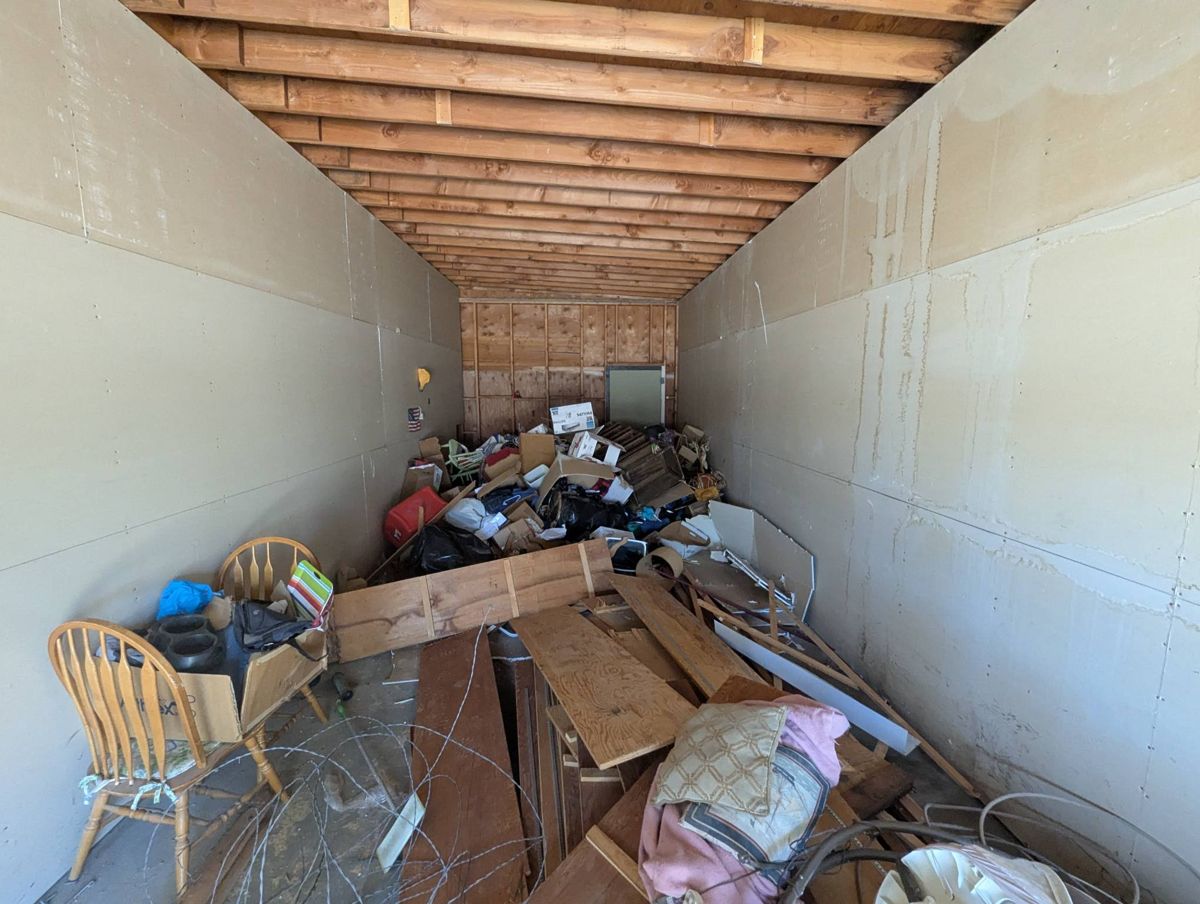 Long storage trailer packed with items before cleanout